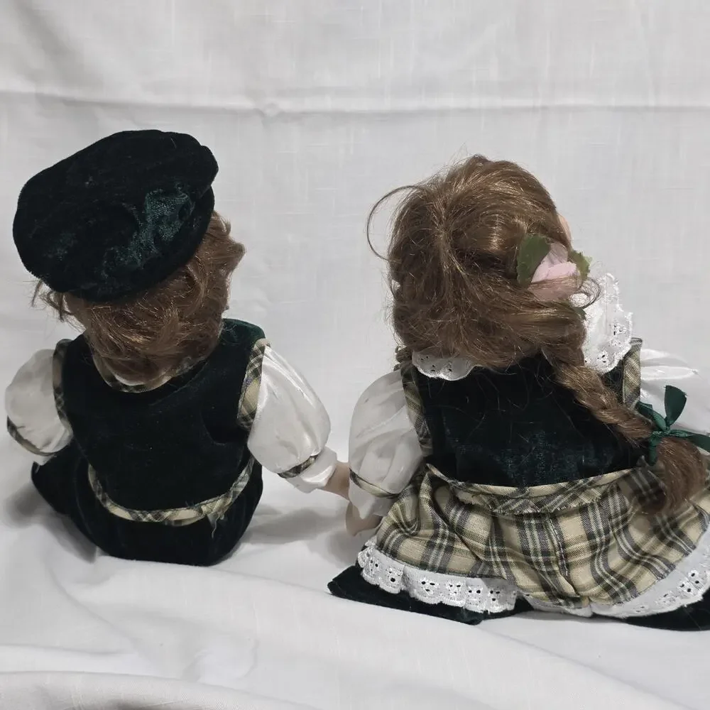 Vintage Collectible Porcelain Twin Dolls in Plaid and Blue Velvet Outfits